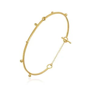 Delphis 18K Gold Bangle
