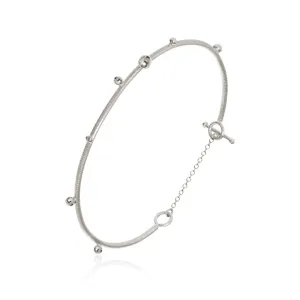 Delphis Silver Bangle