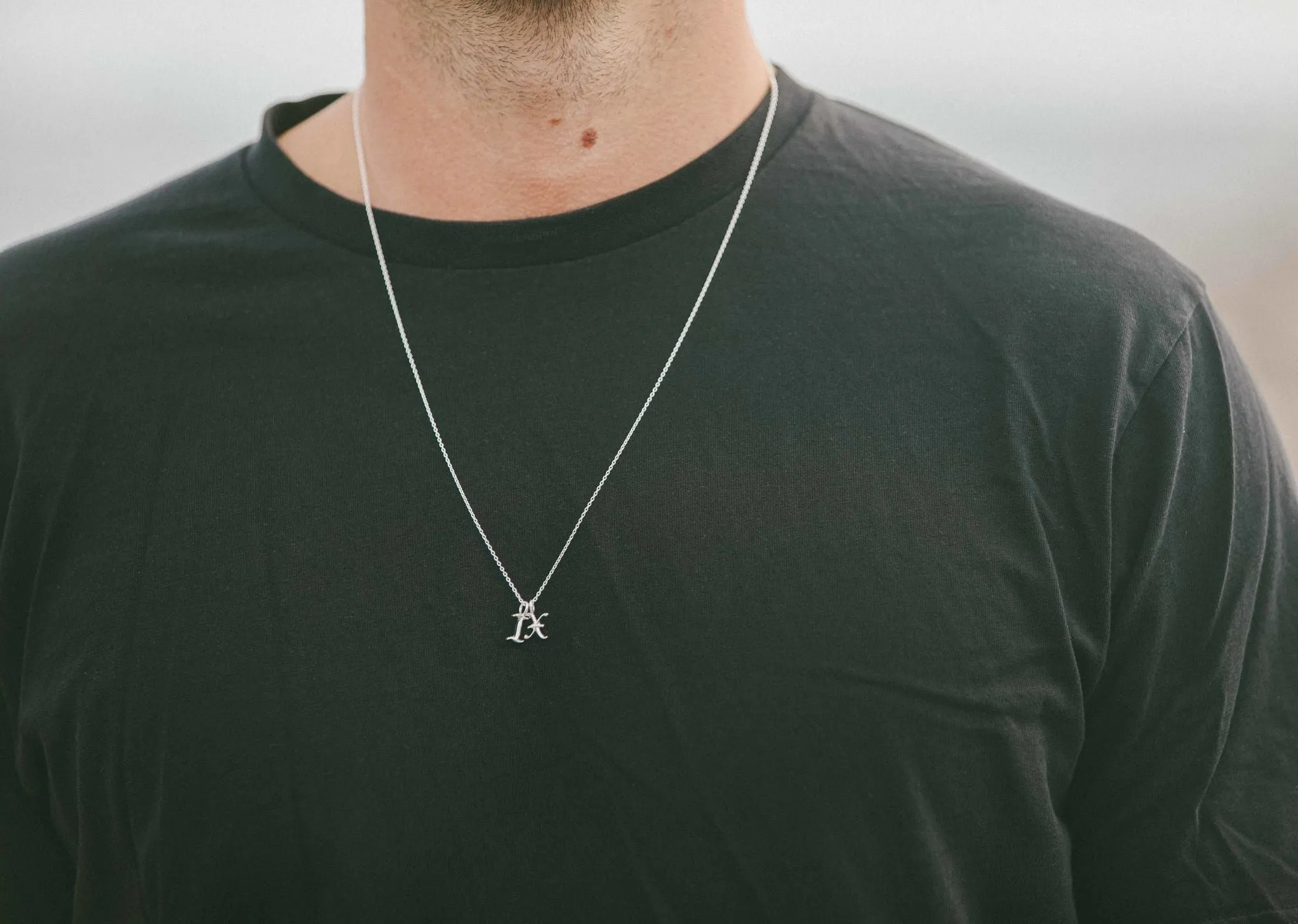 IX Q Letter Silver Pendant
