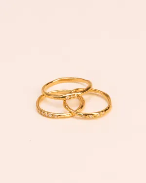 Set of three stacked organic 18K Gold Rings w. Diamonds